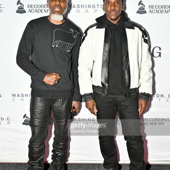 Von Vargas' photographed with National Recording Artist Pusha T at The RA DC Holiday Party. Photo by Shannon Finney: Getty Images