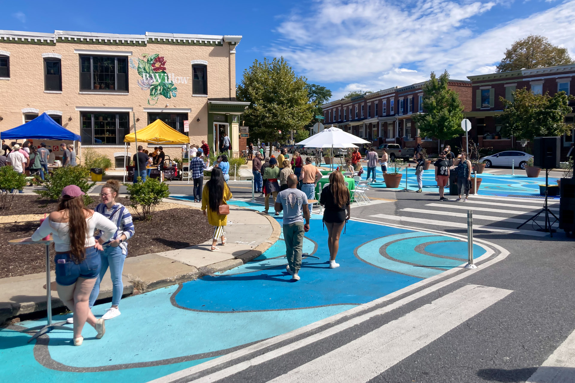 Remingtopo crosswalk art filled with people during RemFest 2022