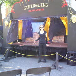 Mary Jane Oelke with Stringling Marionettes about to perform at a local festival 