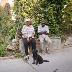 Neighbors in an alley behind Brooks Street