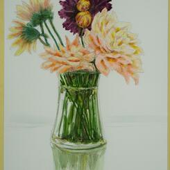 Flowers in a clear vase with reflection