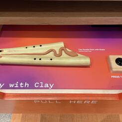 Double flute installed in a discovery drawer of the Wall of Wonder