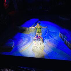 Puck performs to improvised music