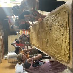 Communal preparation of the clay body