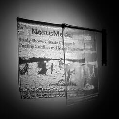 Newspaper, Almost Transparent; Climate Change Migration 2019