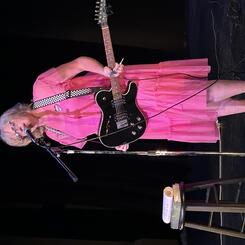 Performing music at the Charm City Kitty Club