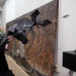 working on devil statue.jpg