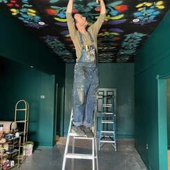 Floral Pattern on the ceiling of Manna Life in Harford County Acrylic and enamel on ceiling tiles, Collin Cessna, 2023