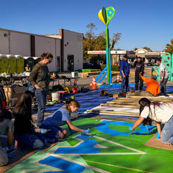 Damascus Placemaking Festival, community build day, local youth painting mural board