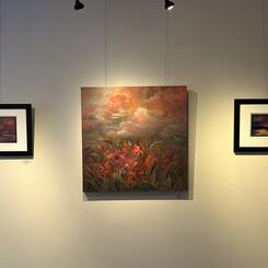 Gallery Installation Site Shot: Enigmatic Paradise in middle of two small works: Sultry Sky over Tar Bay and Captivated 