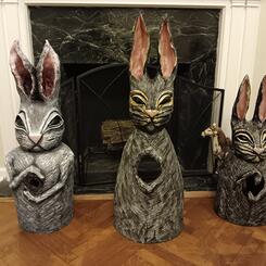 Gathering of Large Votive Rabbits in Front of the Fireplace