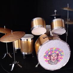View 1 : Miniature Drum Set constructed for the marionette, Rockstar Reptilian to play.