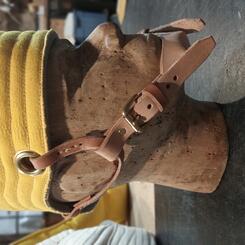 yellow padded hat with chin strap