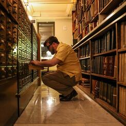 Josh Aterovis searching the card catalog in See Also