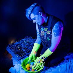 Jess Keyes posing with her Patien(t/ce) system