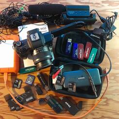 Still shot of Canon M50 and various accessories used for filming