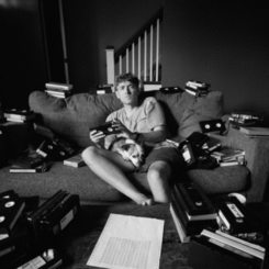 Conor and Sandy surrounded by VHS tapes