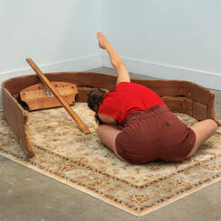 Still from performance of Garment/Gauge