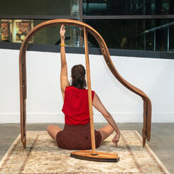 Still from performance of Garment/Gauge