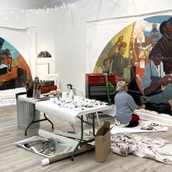 Working Hands mural diptych work-in-progress shot