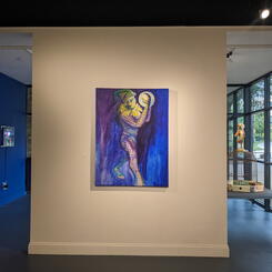 Exit area with acrylic Blue Mardi Gras by Diana Marta; neon by Lili Lakich to the left; Octogenarian assemblage by Mary Opasik to the right