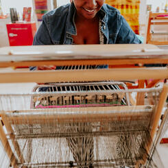 Soft Gather, Quiet Flame participant weaving