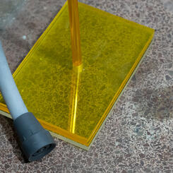 Gray rbbr Cane, 2022. Silicone rubber, wire, lucite  40” x 15” x 20”