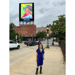 Artist with Blossoming, on LED Baltimore 52 Ft, Billboard,