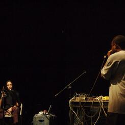 Shodargan Overtone III (Sygyt / сыгыт): Shodekeh's very 1st concept of collaborating with a professional Throat Singer, which was Fuyuki Yamakawa of Tokyo, Japan. This took place at the High Zero Festival of Experimental Improvised Music, 2006.