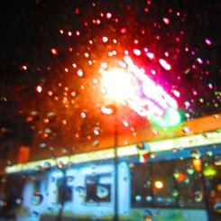 diner stop through a rainy car window