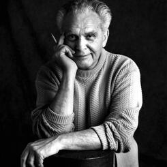 The late Jacob Kurtzberg (better known as Jack Kirby) photographed by Suzy Skaar, 1992. (Image shared via Wikipedia Commons). 