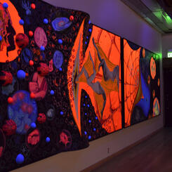 15 Billion Years of the Traveling Atom under Black Light