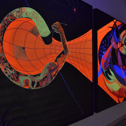 Mina Cheon's 15 Billion Years of the Traveling Atom under Black Light at Maryland Art Place