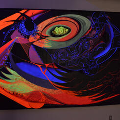 Mina Cheon's 15 Billion Years of the Traveling Atom under Black Light at Maryland Art Place