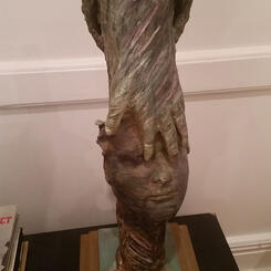 "A Face In Time",  Two Sculptures On the Round. 