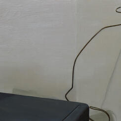 untitled (coat hanger and router)