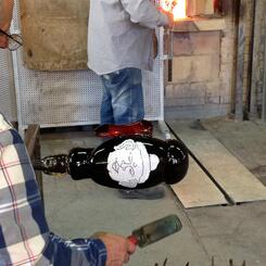   Beaded face gathered on hot glass