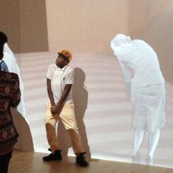 Kid side-stepping with the ladies