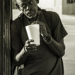 Candid: Man Waiting for the Bus