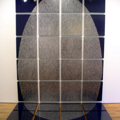 Silver Oval on Dark Blue