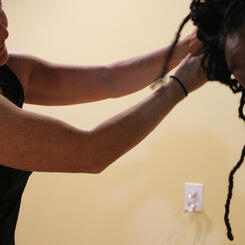 With The Touch of her Hand