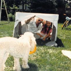 Photograph of my dad and me in our backyard in 1989