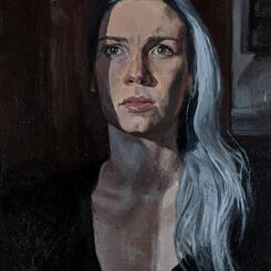portrait of the artist with sun on half her face and blue grey hair