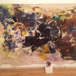 On the edge of the prairie, where the sun had gone down, the sky was turquoise blue, like a lake, with a gold light throbbing in it