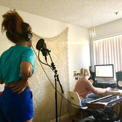 Recording vocals for the song