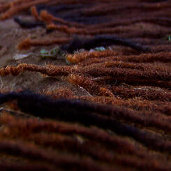 Grounding Ceremony Video Still - Cut Hair on Earth