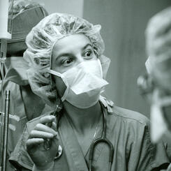 Pediatric Surgeon Discussing Sutures