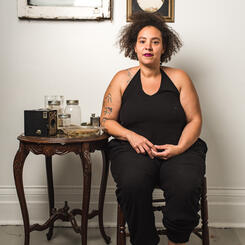 Alisha Wormsely, sitting with the work