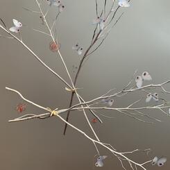 Wrapped branches with butterflies. 