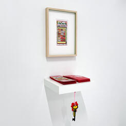 SOS framed lottery ticket and edition, exhibition view 